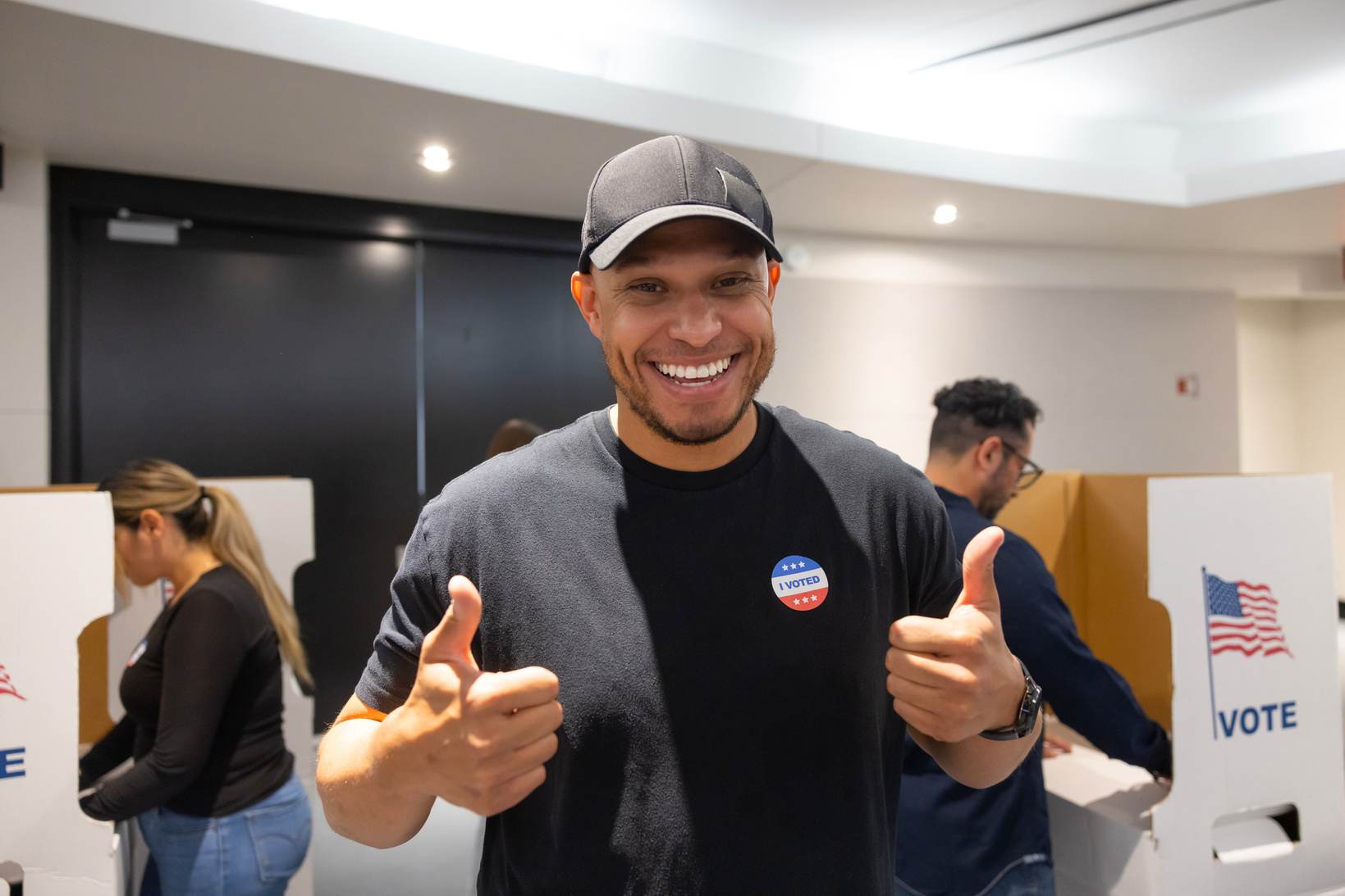 Person at voting booth